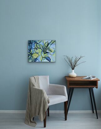 Layers of paint in broad leaf and flower shapes overlap in a colours ranging from silvers, blues, greens, pinks amid highlights of black and white.