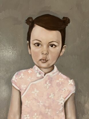 Portrait of a girl in a Chinese dress with a textured background