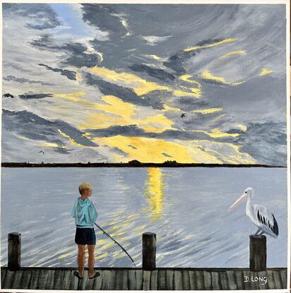 A boy fishing next to the river while a pelican watches.