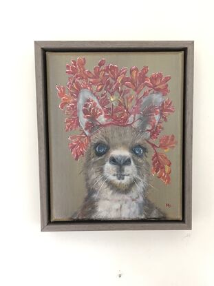 Kangaroo wearing kangaroo paw headdress 