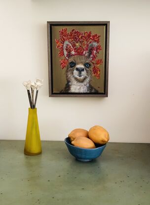 Kangaroo wearing kangaroo paw headdress 