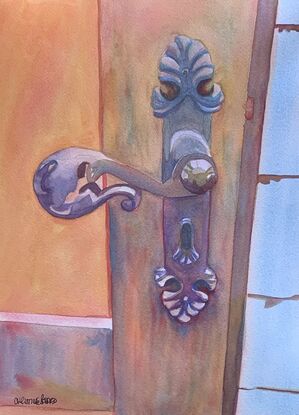 artwork showing a close up of wrought iron door handle