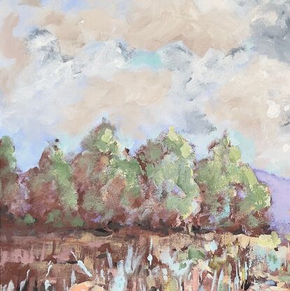 An impressionistic and softly coloured landscape with clouds trees and water