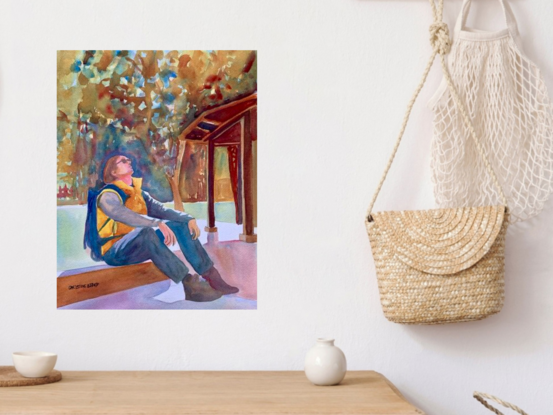 artwork showing a man resting on a bench looking skywards