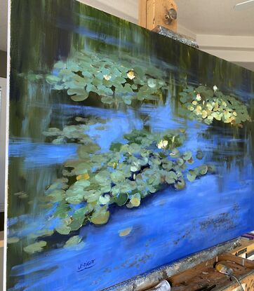 Lilly pad, pond, water lilies, blue water, blues and greens, reflections on water