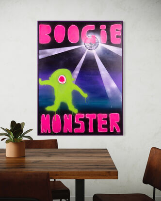 Dancing green monster on a dark disco ball lit dance floor. Hot pink text reads BOOGIE MONSTER.