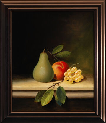 Pear and grapes placed on table top