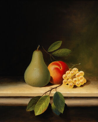 Pear and grapes placed on table top