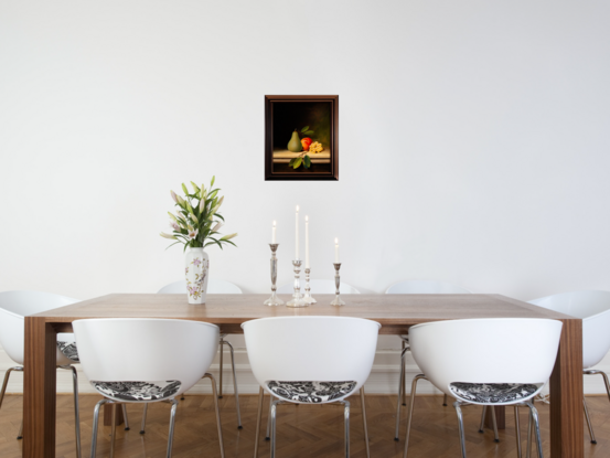 Pear and grapes placed on table top