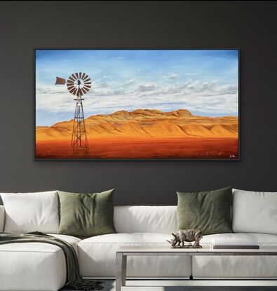 Outback desert mountains and windmill