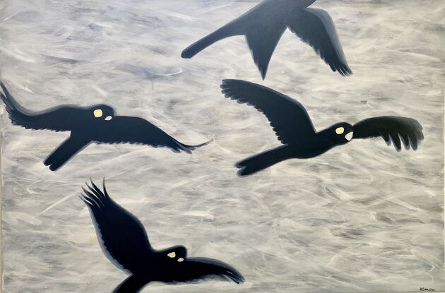 A Flock of Black cockatoos in an open sky