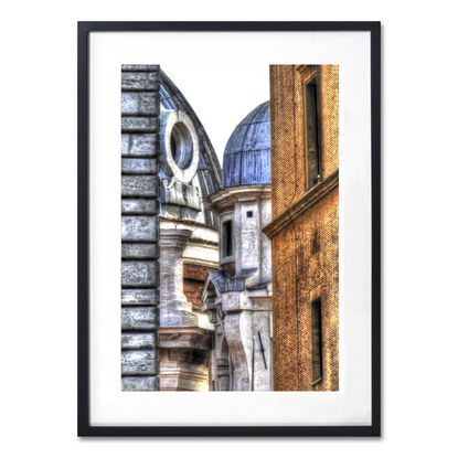 Ancient buildings seen through an alley in Rome, Italy