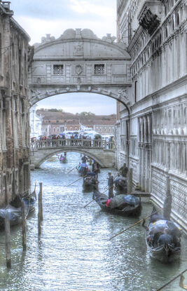 Five gondolas on the Grand Canal in Venice Italy