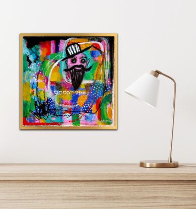 A fun piece with bright colours of blue, green,  pink, yellow and red with a male face with a moustache like Dali's and a beard. He is wearing a black and white striped, brimmed hat. 