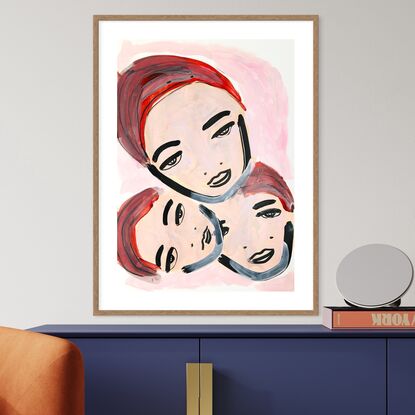 Three faces  in pink and red