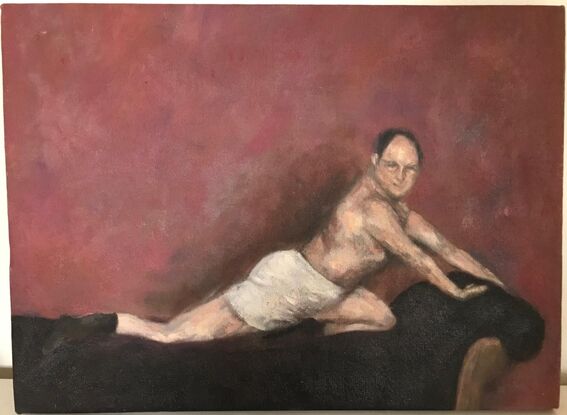 George Costanza shirtless pose on a couch