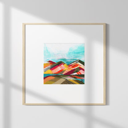 Abstract acrylic painting with bright strokes of colour and texture creating the impression of fields and mountainous landscape. 