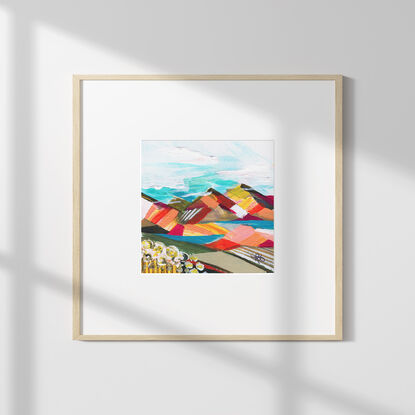 Abstract acrylic painting with bright strokes of colour and texture creating the impression of fields and mountainous landscape. 