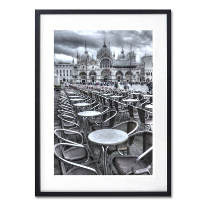 Vacant tables on St Marks Square Venice, Italy