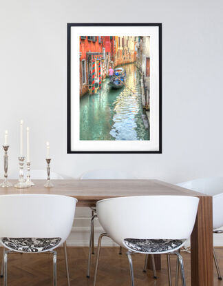 Gondola on canal in Venice, Italy