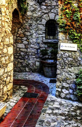 Inviting sunlit street scene in Volterra, Tuscany, Italy