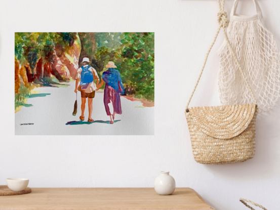 artwork showing a couple walking along a cliff side road in the sunshine