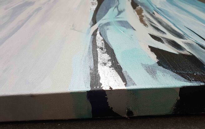 an abstract seascape of a coastline with white, a metallic seafoam, silver leaf, shades of aqua and light blue, light grey and ebony black.