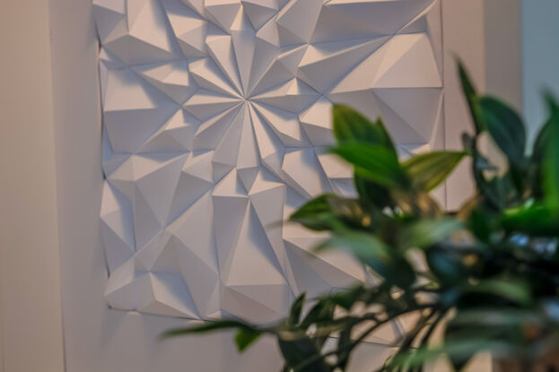 White abstract geometric paper wall art.