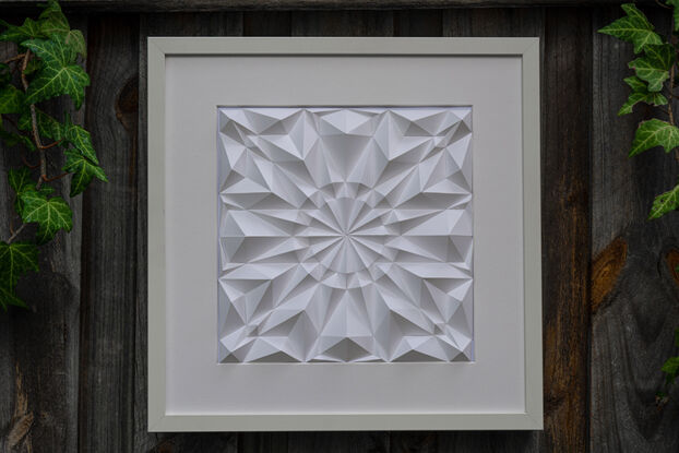 White abstract geometric paper wall art.