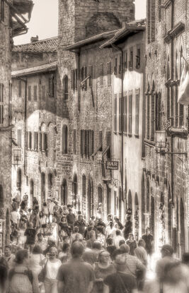 Busy street in Volterra Tuscany, Italy