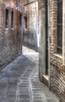 Busy street in Volterra Tuscany, Italy