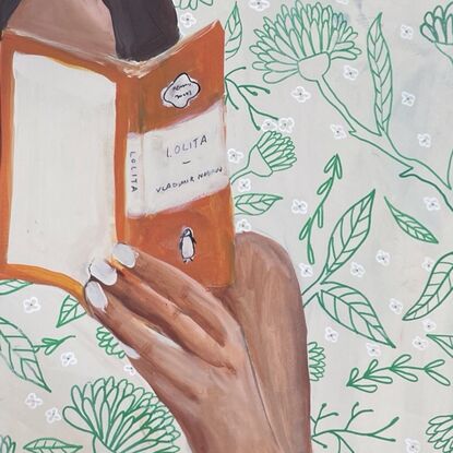 Beige background, woman reading book