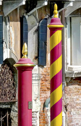 Mooring poles on Grand Canal, Venice, Italy