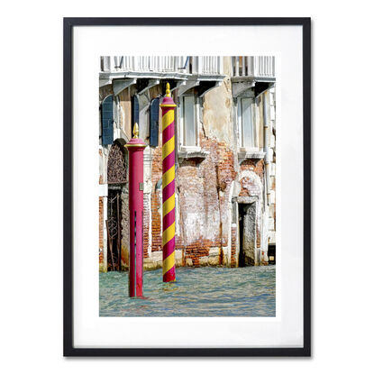 Mooring poles on Grand Canal, Venice, Italy