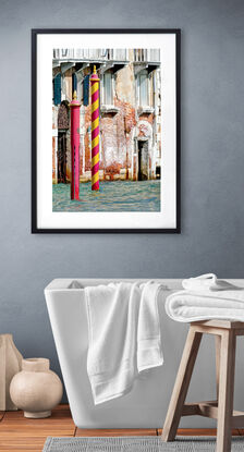 Mooring poles on Grand Canal, Venice, Italy