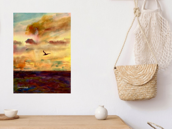 artwork showing a colourful sunrise over the sea