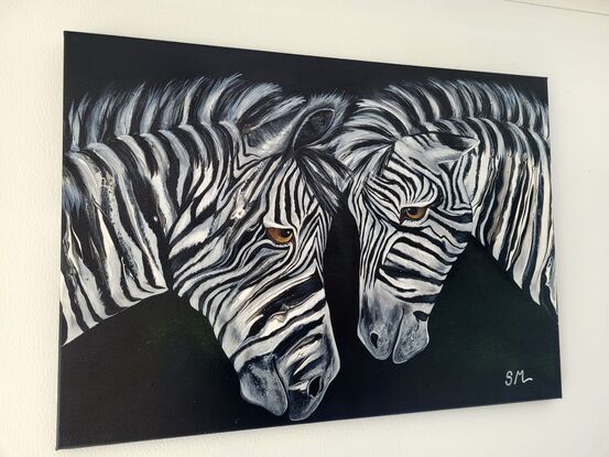 The expressions on the zebras' faces are enigmatic, hinting at a complex range of emotions. Perhaps there is a hint of curiosity, or maybe even a touch of affection, in the way they regard each other. Whatever the case may be, the painting invites the viewer to ponder the nature of the bond shared between these two animals