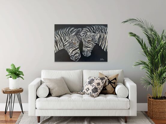 The expressions on the zebras' faces are enigmatic, hinting at a complex range of emotions. Perhaps there is a hint of curiosity, or maybe even a touch of affection, in the way they regard each other. Whatever the case may be, the painting invites the viewer to ponder the nature of the bond shared between these two animals