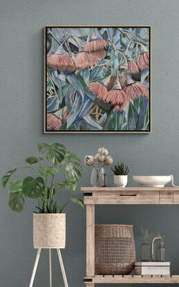 A framed oil painting of pink Australian gum flowers, leaves and blue sky with late afternoon shadows by Amanda Cameron.