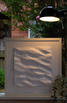 White abstract geometric paper wall art.