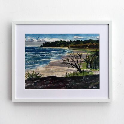 A watercolour painting made in a modern style captures the vastness of a surf beach on North Stradbroke Island, Queensland. The artist made the painting while on location in a method referred to as 'en plein air'. This method grants the painting a fresh and expressive look that suits the subject of wild weather rolling in from the sea. The beach is a beige expanse with lavender shadows falling across it from the large thunderheads above. The wind swept form of a dark skeletal tree in the foreground hints at the danger posed by weather on the island and is formally linked, via shared tonal value, to the mass of stone the artist has depicted in the foreground. This stone implies that she was sitting atop the rock formation as she worked on the piece.