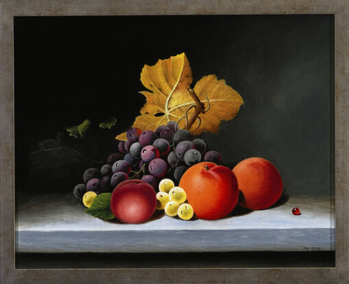 Golden Autumn leaf and fresh fruit on tabletop