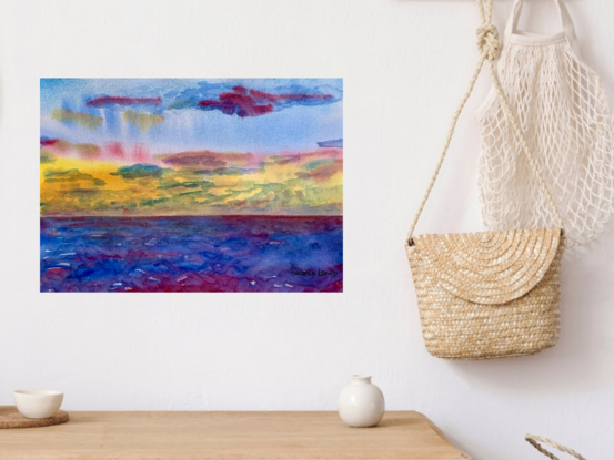 artwork showing a colourful sunrise over the sea