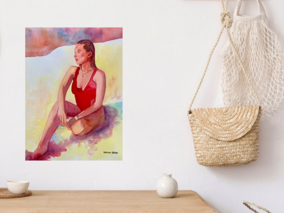 artwork showing a swimsuited woman staring across the beach out to sea
