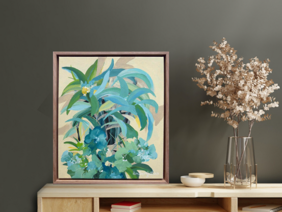 small framed original painting of a tropical island theme with green and blue palm trees, tropical flowers and a yellow background.