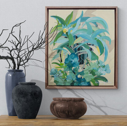 small framed original painting of a tropical island theme with green and blue palm trees, tropical flowers and a yellow background.