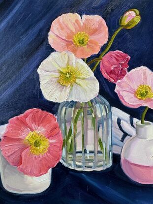 Bight poppies in vases with navy background