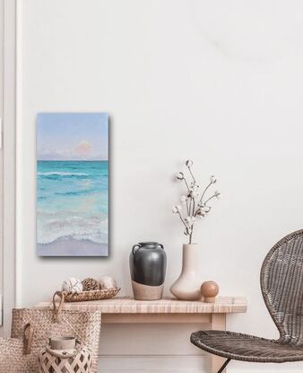 Vertical painting of the ocean at dusk. The sea is a soft turquoise and the setting sun is reflecting on the ocean. 