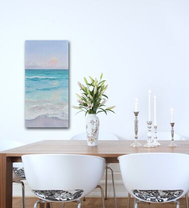 Vertical painting of the ocean at dusk. The sea is a soft turquoise and the setting sun is reflecting on the ocean. 