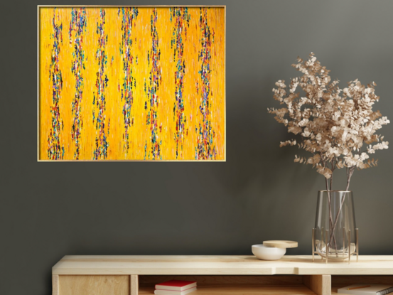 "Live Your Dreams" is a textured artwork featuring a yellow background adorned with colorful patterns. It embodies a message of encouragement to pursue one's aspirations, celebrating the vibrancy of imagination and the limitless potential within each individual.